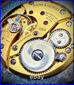 #911 B Watch movement baume mercier 1050 for parts working manual wind