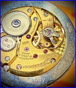 #911 B Watch movement baume mercier 1050 for parts working manual wind