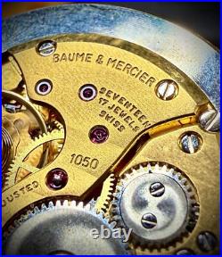 #911 B Watch movement baume mercier 1050 for parts working manual wind