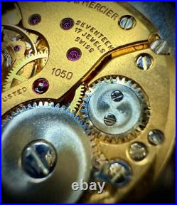#911 B Watch movement baume mercier 1050 for parts working manual wind