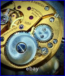 #911 B Watch movement baume mercier 1050 for parts working manual wind