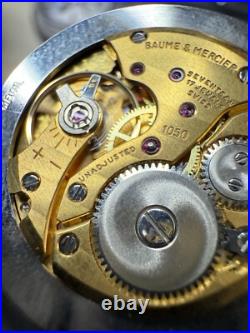 #911 B Watch movement baume mercier 1050 for parts working manual wind