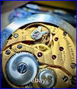 #911 B Watch movement baume mercier 1050 for parts working manual wind