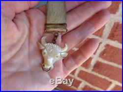 ANTIQUE VICTORIAN HAND CARVED MOP BULL STEER WATCH FOB on COWHAIR STRAP used
