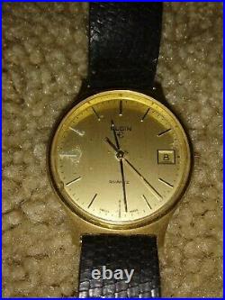Elgin Quartz Swiss Made chipped glass hour hand bent. For parts as is 1980 s