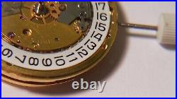 GENUINE ETA 2824 movement yellow, runs. For watch repair or parts