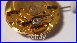 GENUINE ETA 2824 movement yellow, runs. For watch repair or parts