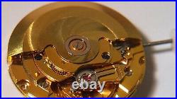 GENUINE ETA 2824 movement yellow, runs. For watch repair or parts