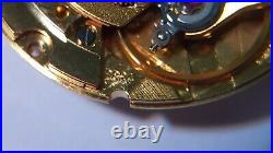 GENUINE ETA 2824 movement yellow, runs. For watch repair or parts