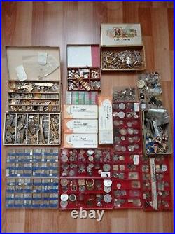 Huge lot of mechanisms, hands and parts for watches and watchmakers