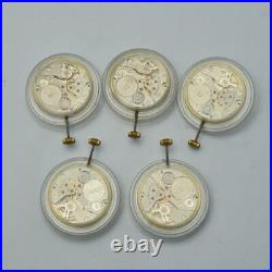 ID-405153735254Lot 5 Vostok Cal. 2214 Manual Winding NOS Watch Movement For Parts