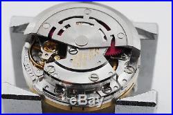 Rolex 2030 Movement, dial, hands, gold/yellow crown used. Oyster Perpetual Date